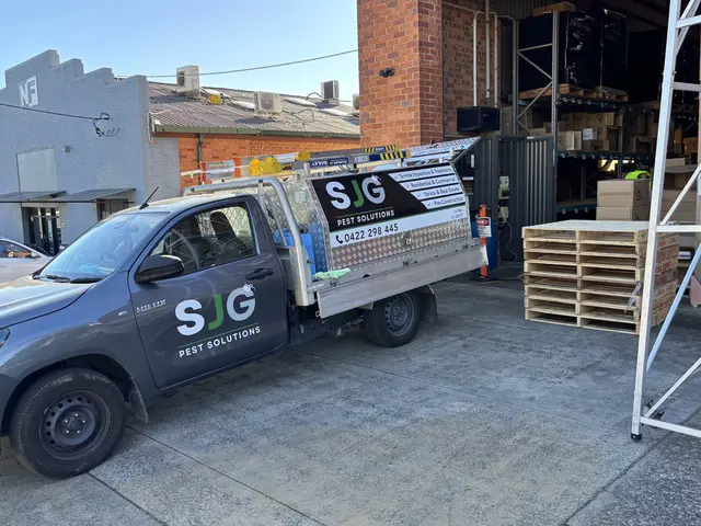 SJG Pest Solutions service ute at a Sydney commercial loading dock