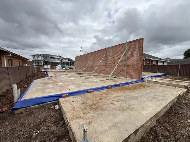 Perimeter termite barrier run around a new house slab before brickwork